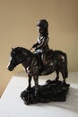 Female equestrian rider in bronze