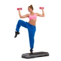 Female Exercise On Aerobic Step With Hand Weights