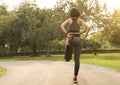 Women exercising stretch her leg relax to muscle for running.