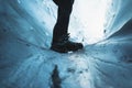 Female explorer in the ice cave, Iceland