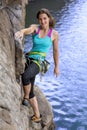 Female extreme climber conquers steep rock Royalty Free Stock Photo