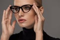 Female Eyewear Style. Beautiful Woman In Fashion Eyeglasses