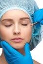 Female face before plastic surgery operation Royalty Free Stock Photo
