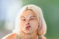 Female face pressed against glass or window