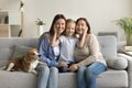 Female family portrait with adorable beagle dog