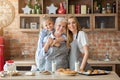 Female family taking photo while cooking together Royalty Free Stock Photo