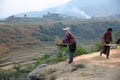 Woman Sifts Grain in Rural Bhutan