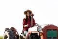 Female farmer driving a tractor