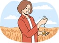 Female farmer inspect crops in field Royalty Free Stock Photo