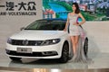 Female fashion models and vw in chengdu international auto show