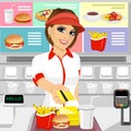 Female fast food restaurant employee returning a credit card Royalty Free Stock Photo