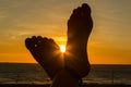 Female feeds towards the sunset. Vacation concept, point of view, Broom, Australia