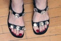 Female feet in open toe sandals Royalty Free Stock Photo