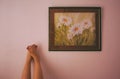 Female feet and painting on the wall