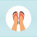 Female feet with a pedicure in the summer flip-flops Royalty Free Stock Photo