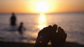 Female feet on tropical beach. Happy woman enjoying stay on ocean beach at sunset Royalty Free Stock Photo