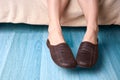 Female feet and slippers Royalty Free Stock Photo