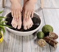 Female feet at spa salon on pedicure procedure Royalty Free Stock Photo
