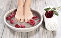 Female feet at spa salon on pedicure procedure