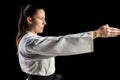 Female fighter performing karate stance Royalty Free Stock Photo