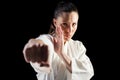 Female fighter performing karate stance Royalty Free Stock Photo