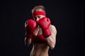 Female fighter in red gloves