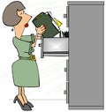 Female file clerk standing on her tip-toes Royalty Free Stock Photo