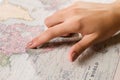 Female finger showing position on map Royalty Free Stock Photo