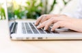 Female fingers on a laptop trackpad close-up