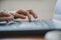 Female fingers typing on laptop computer Royalty Free Stock Photo