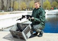 Female holding sturgeon fish