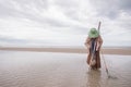 Female fishermen looking for shellfish