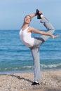 Female fitness on seashore