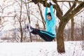 Female fitness sport model outdoor in cold winter weather Royalty Free Stock Photo