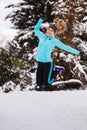 Female fitness sport model outdoor in cold winter weather Royalty Free Stock Photo