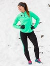 Female fitness sport model outdoor in cold winter weather Royalty Free Stock Photo