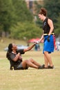 Female Flag Football Player Helps Teammate Get Up Royalty Free Stock Photo