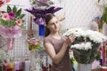 Female Florist With Bunch Of Flowers