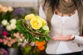 Female florist in flower shop Royalty Free Stock Photo