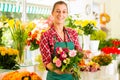 Female florist in flower shop Royalty Free Stock Photo