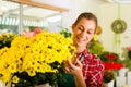 Female florist in flower shop