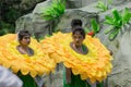 Female folk dancers in colorful make up