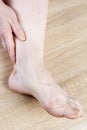 Female foot and arm Royalty Free Stock Photo