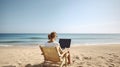 Female freelance programmer in chaise-longue lounge working coding surfing on notebook computer. Perks of distance work concept.