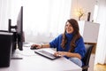 Female freelancer working in home office Royalty Free Stock Photo