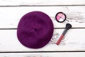 Female french beret and cosmetics.