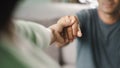 Female friend or family holding hands during cheer up to mental depress man, Psychologist provides mental aid to patient. PTSD Royalty Free Stock Photo