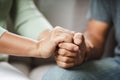 Female friend or family sitting and hold hands during cheer up to mental depress man, Psychologist provides mental aid to patient Royalty Free Stock Photo