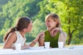 Female friends picknicking Royalty Free Stock Photo