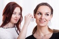 Female friends preparing for a party Royalty Free Stock Photo